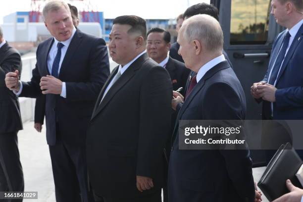 Russian President Vladimir Putin and North Korean leader Kim Jong-un visit a construction site of the Angara rocket launch complex on September 13,...