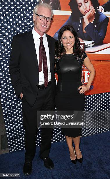 Actress Julia Louis-Dreyfus and husband writer Brad Hall attend the premiere of HBO's "VEEP" Season 2 at Paramount Studios on April 9, 2013 in...