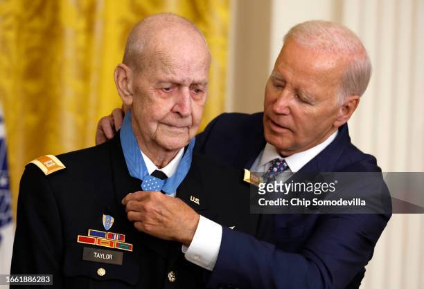 Retired U.S. Army Captain Larry Taylor is awarded the Medal of Honor by President Joe Biden in a ceremony in the East Room of the White House on...