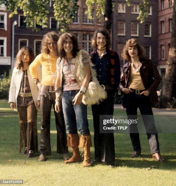 English musicians Ken Hensley , Keith Baker, Mick Box, Paul Newton and David Byron , of the English rock band Uriah Heap, pose for a group portrait...