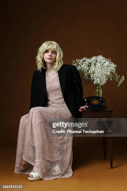 beautiful woman wearing a long lace dress with crop blazer - sudbury stock pictures, royalty-free photos & images