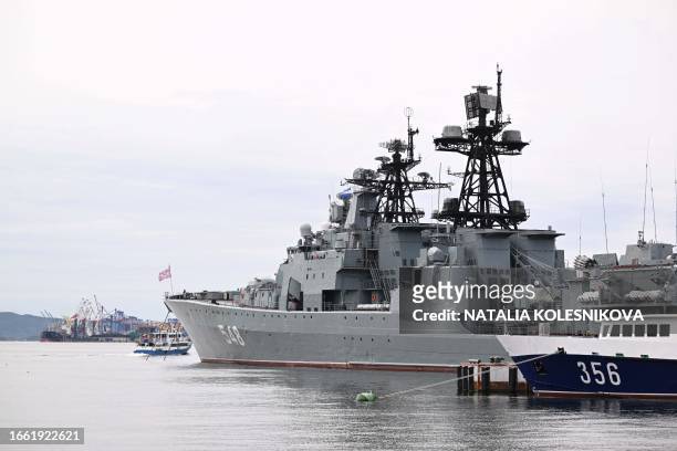 Photograph taken on September 13, 2023 shows a Russian navy ship in the Russian port city of Vladivostok on Golden Horn Bay .