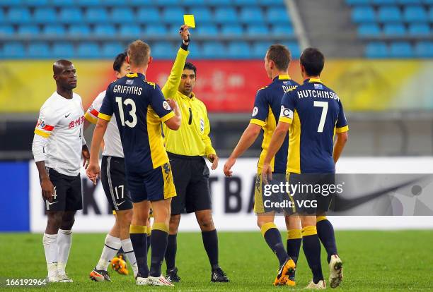 Mitchell Duke of Central Coast Mariners is shown the yellow card during the AFC Champions League match between Guizhou Renhe and Central Coast...