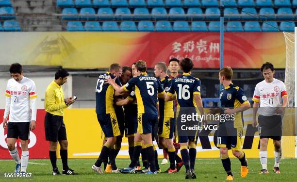 Central Coast Mariners players celebrate after Mitchell Duke scored his team's first goal from a penalty spot during the AFC Champions League match...