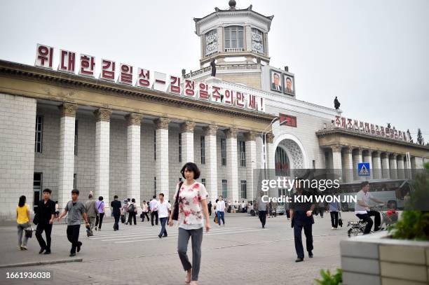 People walk outside Pyongyang, the capital of North Korea, Railway Station in Pyongyang, the capital of North Korea, on September 13, 2023.