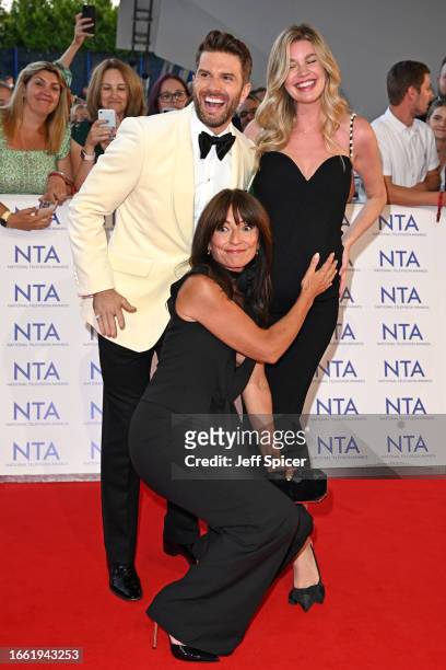 Joel Dommett, Davina McCall and Hannah Cooper attend the National Television Awards 2023 at The O2 Arena on September 05, 2023 in London, England.