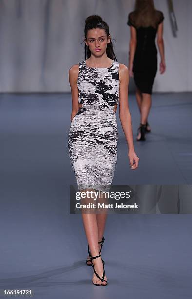 Model showcases designs by Watson X Watson on the runway at the Watson X Watson show during Mercedes-Benz Fashion Week Australia Spring/Summer...