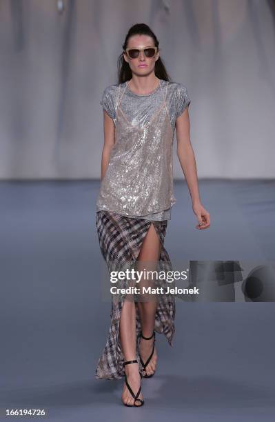 Model showcases designs by Watson X Watson on the runway at the Watson X Watson show during Mercedes-Benz Fashion Week Australia Spring/Summer...