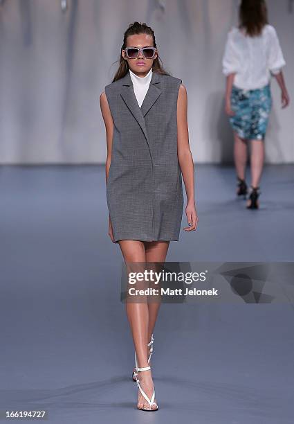 Model showcases designs by Watson X Watson on the runway at the Watson X Watson show during Mercedes-Benz Fashion Week Australia Spring/Summer...