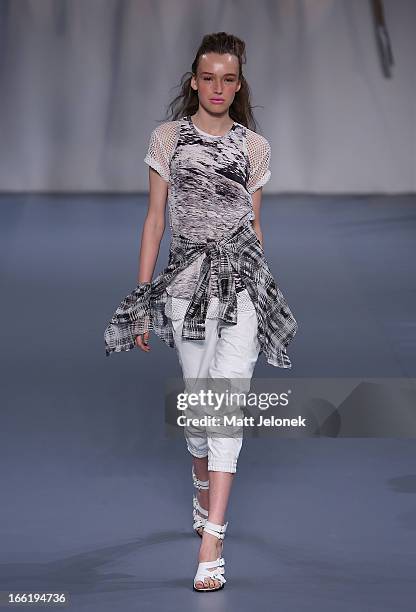 Model showcases designs by Watson X Watson on the runway at the Watson X Watson show during Mercedes-Benz Fashion Week Australia Spring/Summer...