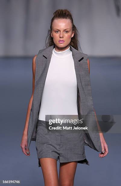 Model showcases designs by Watson X Watson on the runway at the Watson X Watson show during Mercedes-Benz Fashion Week Australia Spring/Summer...