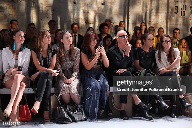 Ashley Edes of IMG and Simon Lock sit front row at the Watson X Watson show during Mercedes-Benz Fashion Week Australia Spring/Summer 2013/14 at...