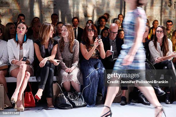 Ashley Edes of IMG and Simon Lock sit front row at the Watson X Watson show during Mercedes-Benz Fashion Week Australia Spring/Summer 2013/14 at...