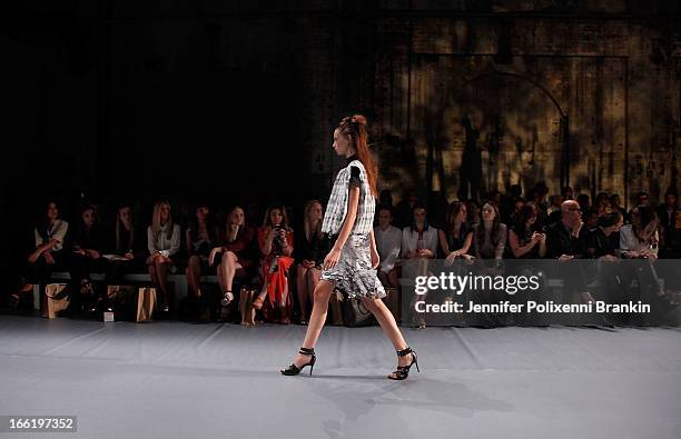 Model showcases designs by Watson X Watson on the runway at the Watson X Watson show during Mercedes-Benz Fashion Week Australia Spring/Summer...