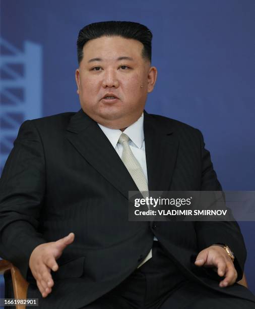 This pool image distributed by Sputnik agency shows North Korea's leader Kim Jong Un during his visit at the Vostochny Cosmodrome in Amur region on...