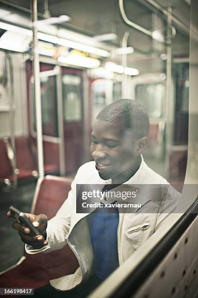 texting a message - toronto subway stock pictures, royalty-free photos & images