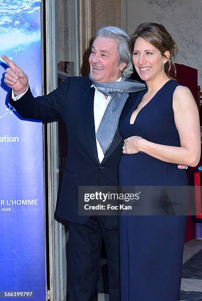 Alain Delon and Maud Fontenoy attend the Maud Fontenoy Foundation - Annual Gala Arrivals at Hotel de la Marine on April 9, 2013 in Paris, France.