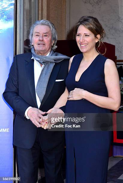 Alain Delon and Maud Fontenoy attend the Maud Fontenoy Foundation - Annual Gala Arrivals at Hotel de la Marine on April 9, 2013 in Paris, France.
