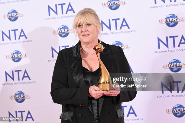 Sarah Lancashire, winner of the Special Recognition award and the Drama Performance award for her work in "Happy Valley", poses in the National...