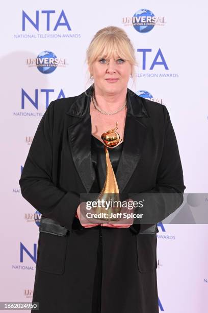 Sarah Lancashire, winner of the Special Recognition award and the Drama Performance award for her work in "Happy Valley", poses in the National...