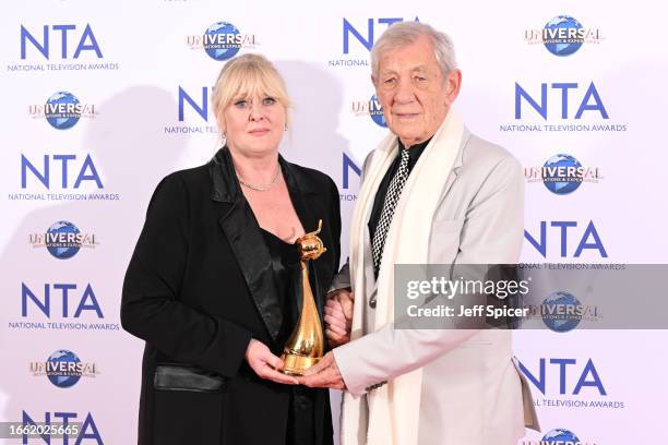 Sarah Lancashire, winner of the Special Recognition award and the Drama Performance award for her work in "Happy Valley", and Sir Ian McKellen pose...