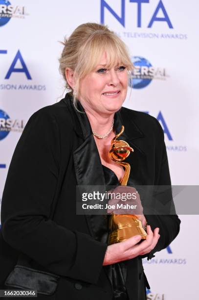 Sarah Lancashire, winner of the Special Recognition award and the Drama Performance award for her work in "Happy Valley", poses in the press room at...