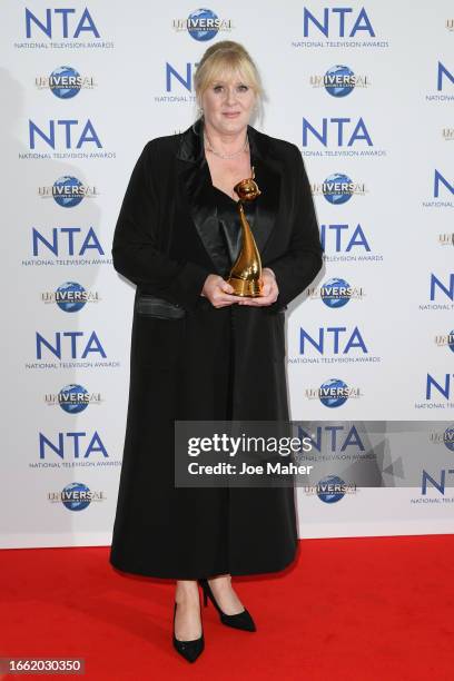 Sarah Lancashire, winner of the Special Recognition award and the Drama Performance award for her work in "Happy Valley", poses in the press room at...