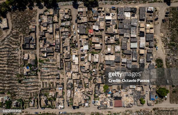 An aerial view of the camp for immigrant workers who work in greenhouse agriculture near the town of Nijar on September 9, 2023 in Almeria, Spain....