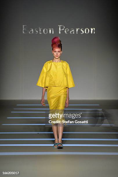 Model showcases designs on the runway at the Mercedes-Benz Presentes - Easton Pearson show during Mercedes-Benz Fashion Week Australia Spring/Summer...