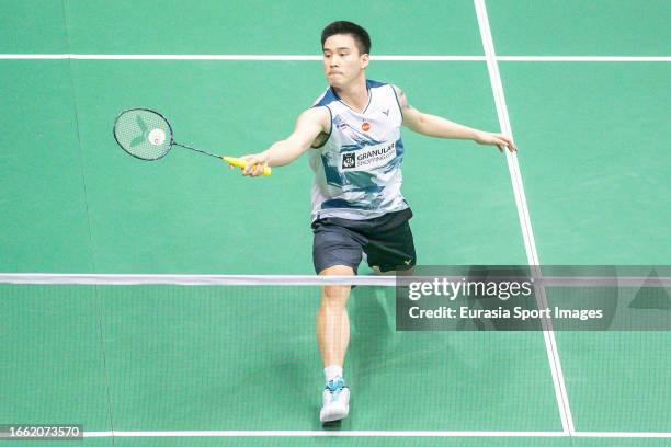 Kantaphon Wangcharoen of Thailand competes in the Men's Single match against Magnus Johannesen of Denmark during day two of the Victor Hong Kong Open...