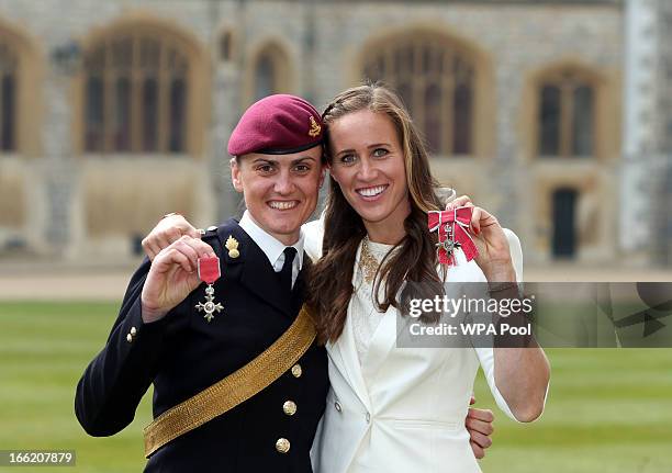 Team GB rowers Helen Glover and Captain Heather Stanning pose after they both received MBE's at an Investiture ceremony at Windsor Castle on April...