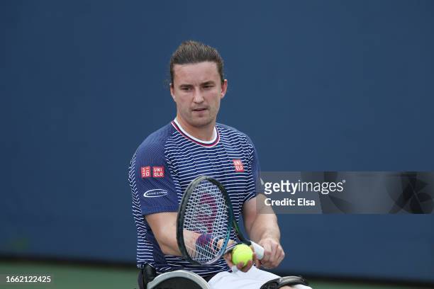 Gordon Reid of Great Britain serves against AlexanderCataldo of Chile during their Men's Wheelchair Singles match on Day Nine of the 2023 US Open at...