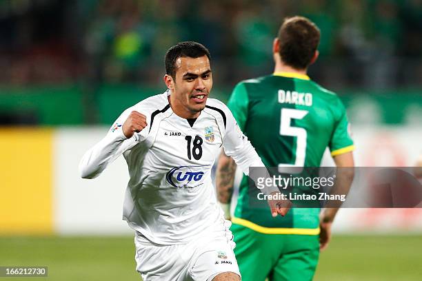 Fozil Musaev of Bunyodkor celebrates scoring his team's first goal during the AFC Champions League Group match between Bunyodkor and Beijing Guoan at...