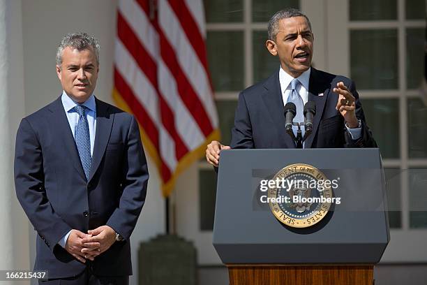 President Barack Obama, right, speaks in the Rose Garden of the White House with Jeffrey Zients, acting director of the Office of Management and...