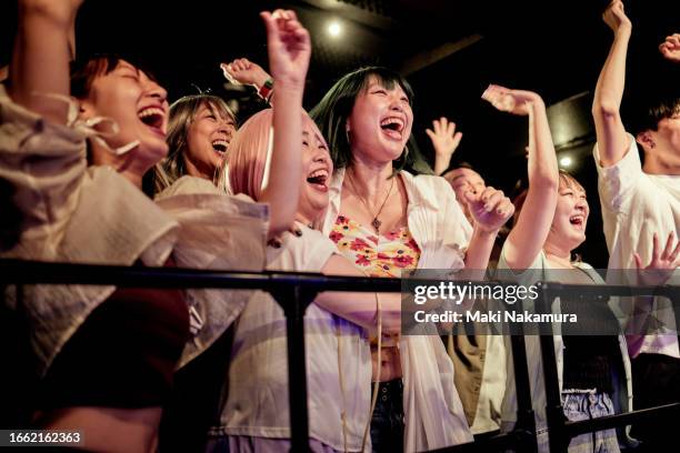 audience at concert hall. - evento en vivo fotografías e imágenes de stock