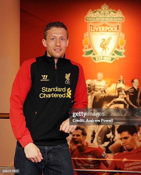 Lucas Leiva of Liverpool signs a long term extension to his contract at Melwood Training Ground on April 10, 2013 in Liverpool, England.