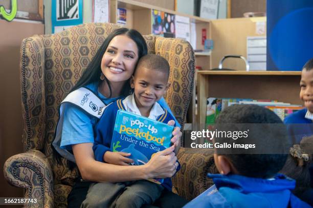 Miss South Africa Natasha Joubert reads to Grade 1 students at Belhar Primary School on World Literacy Day on September 08, 2023 in Cape Town, South...