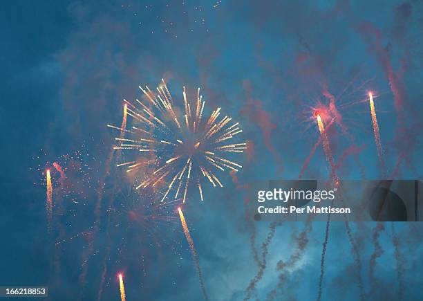 fireworks on blue sky - per mattisson stock-fotos und bilder