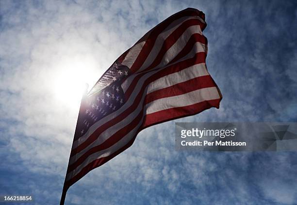 us flag in sun and wind - per mattisson stock-fotos und bilder