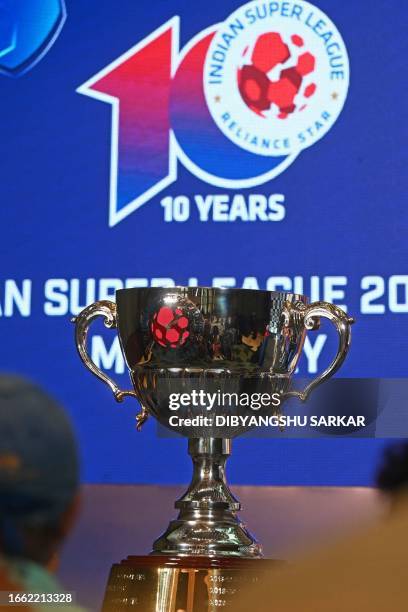 The Indian Super League trophy is displayed during a media conference in Kolkata on September 13, 2023.