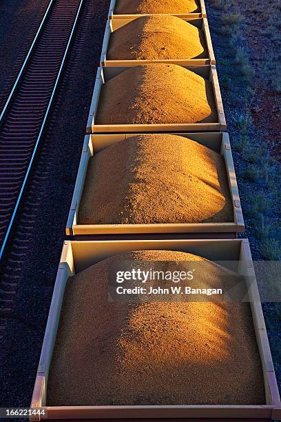 train with iron ore, western australia - iron ore stock pictures, royalty-free photos & images