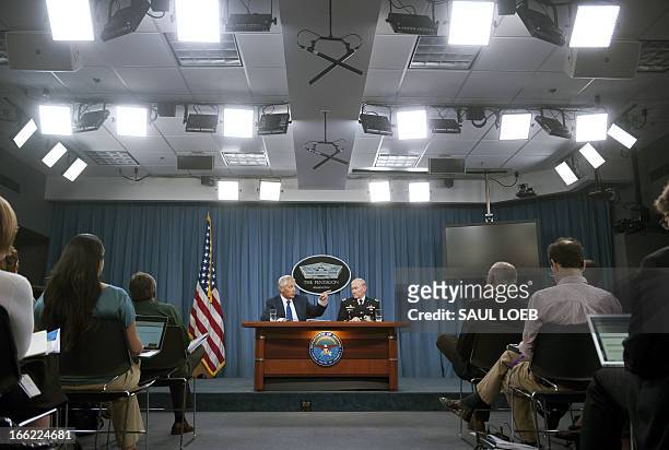 Secretary of Defense Chuck Hagel and Chairman of the Joint Chiefs Martin Dempsey hold a press briefing on the Pentagon's Fiscal Year 2014 budget at...