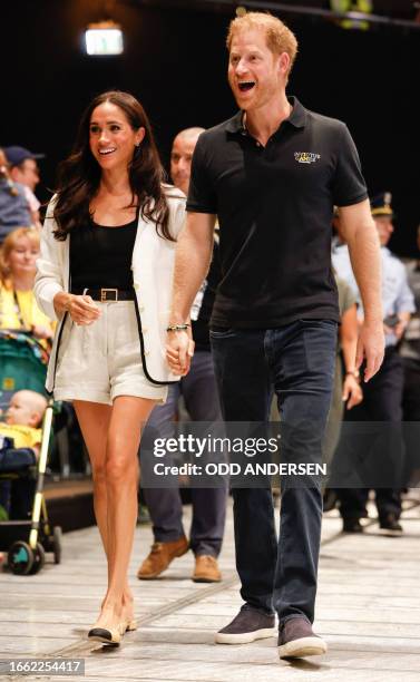 Britain's Meghan, Duchess of Sussexand Britain's Prince Harry, Duke of Sussex, arrive at the 2023 Invictus Games in Duesseldorf, western Germany on...