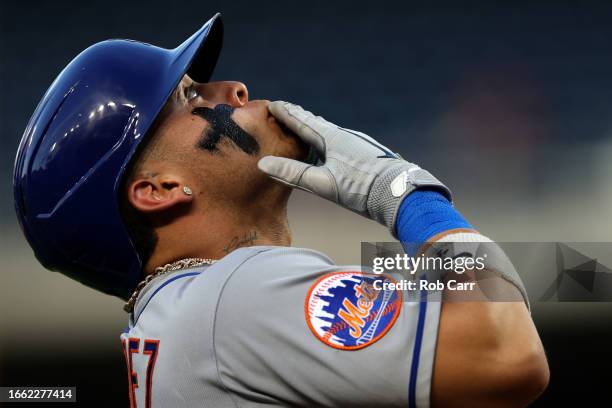 Francisco Alvarez of the New York Mets celebrates while rounding the bases after hitting a three RBI home run against the Washington Nationals in the...