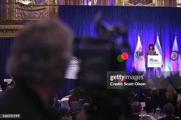 First lady Michelle Obama speaks to guests about combating youth violence at a luncheon April 10, 2013 in Chicago, Illinois. According to published...