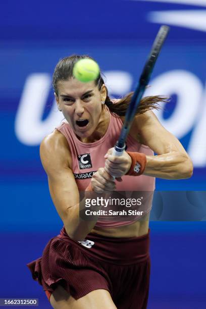 Sorana Cirstea of Romania returns a shot against Karolina Muchova of Czech Republic during their Women's Singles Quarterfinal match on Day Nine of...