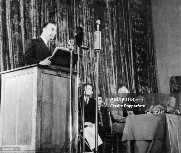 Chilean poet, diplomat and politician Pablo Neruda reads his poem 'Nuevo Canto de Amor a Stalingrad' , at an event held in his honour at the Moscow...