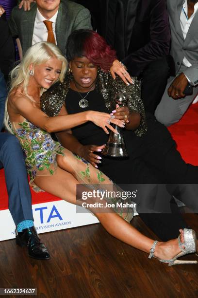 Danielle Harold and Tameka Empson of "EastEnders" celebrate being named Best Serial Drama in the press room at the National Television Awards 2023 at...