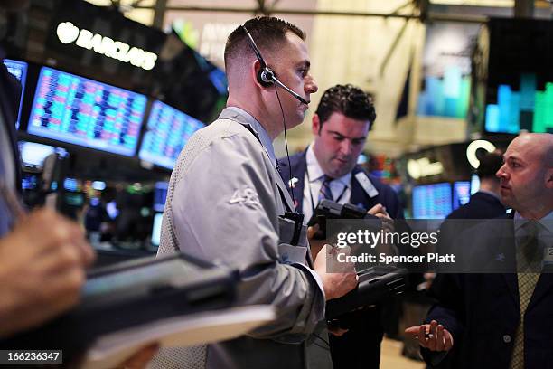 Traders work on the floor of the New York Stock Exchange at the end of the trading day on April 10, 2013 in New York City. The Dow Jones industrial...