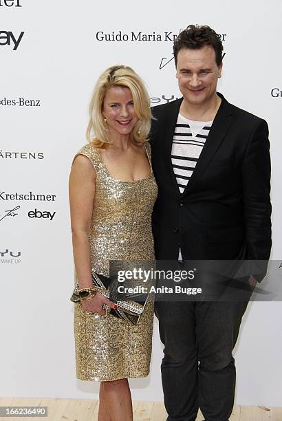 Guido Maria Kretschmer and Leonie Bechtoldt attend the Guido Maria Kretschmer For eBay Collection Launch at Label 2 on April 10, 2013 in Berlin,...
